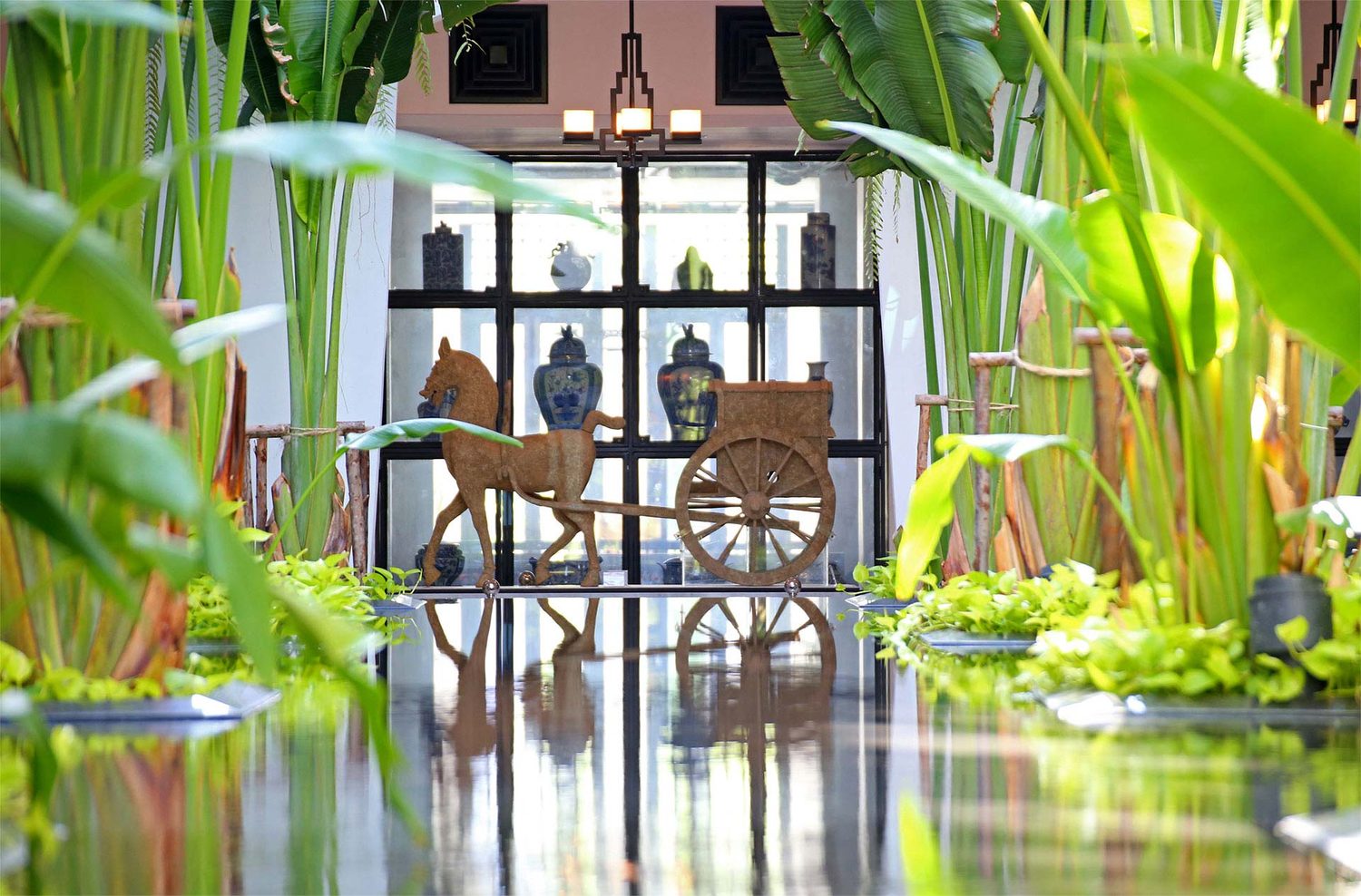 Lobby with garden views — The Siam Hotel