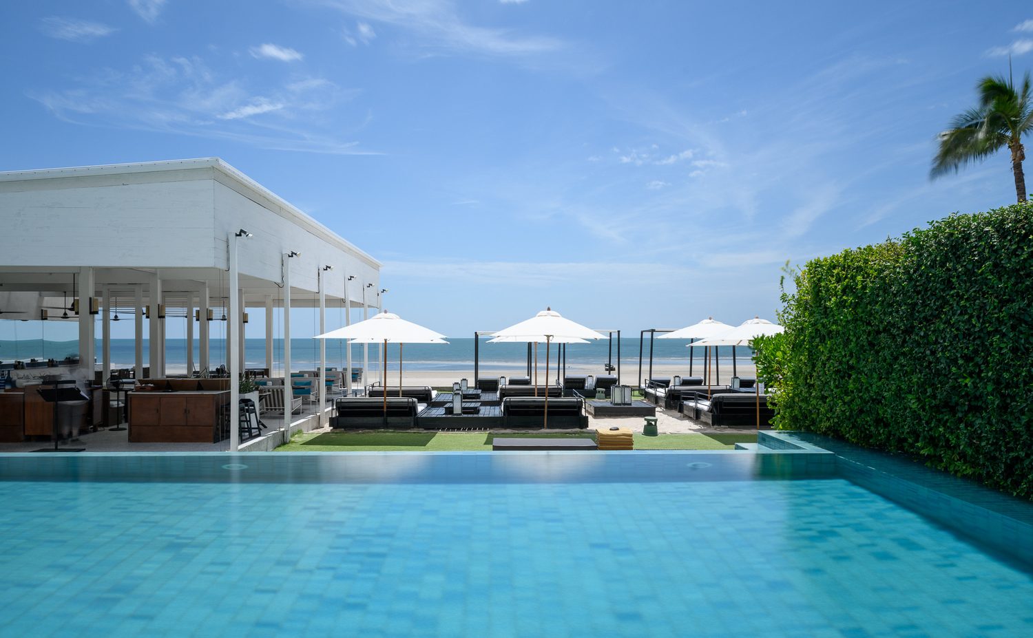 Poolside lounge by the sea — Putahracsa Hua Hin