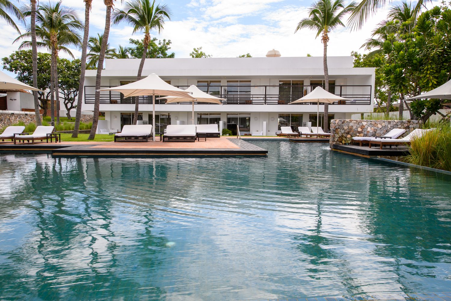 The pool and the villas — Putahracsa Hua Hin
