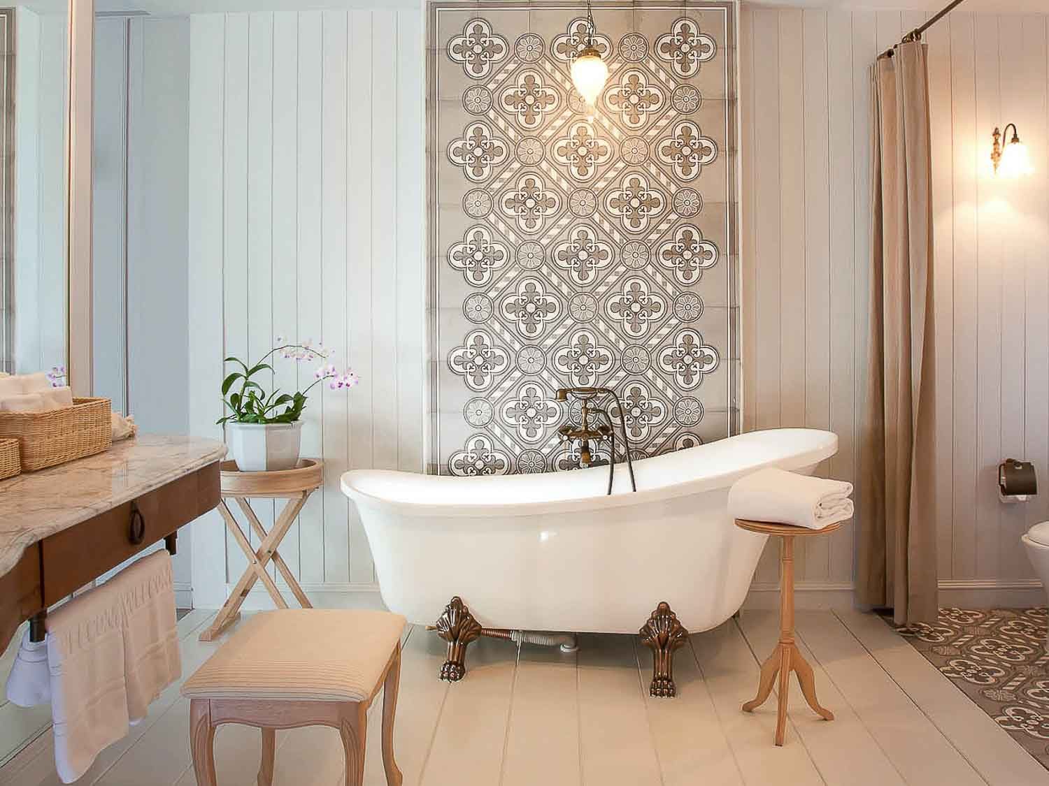 Freestanding bathtub in a suite — Devasom Hua Hin Resort