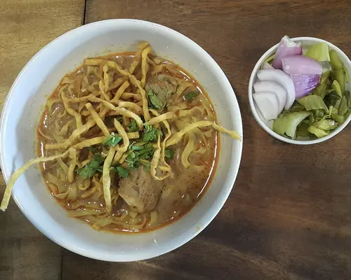 Khao Soi with mild curry and crispy noodles