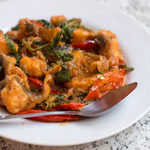 Fried catfish with red curry paste and basil