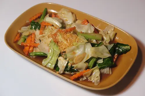 Wild vegetables stir-fried with garlic and light soy sauce