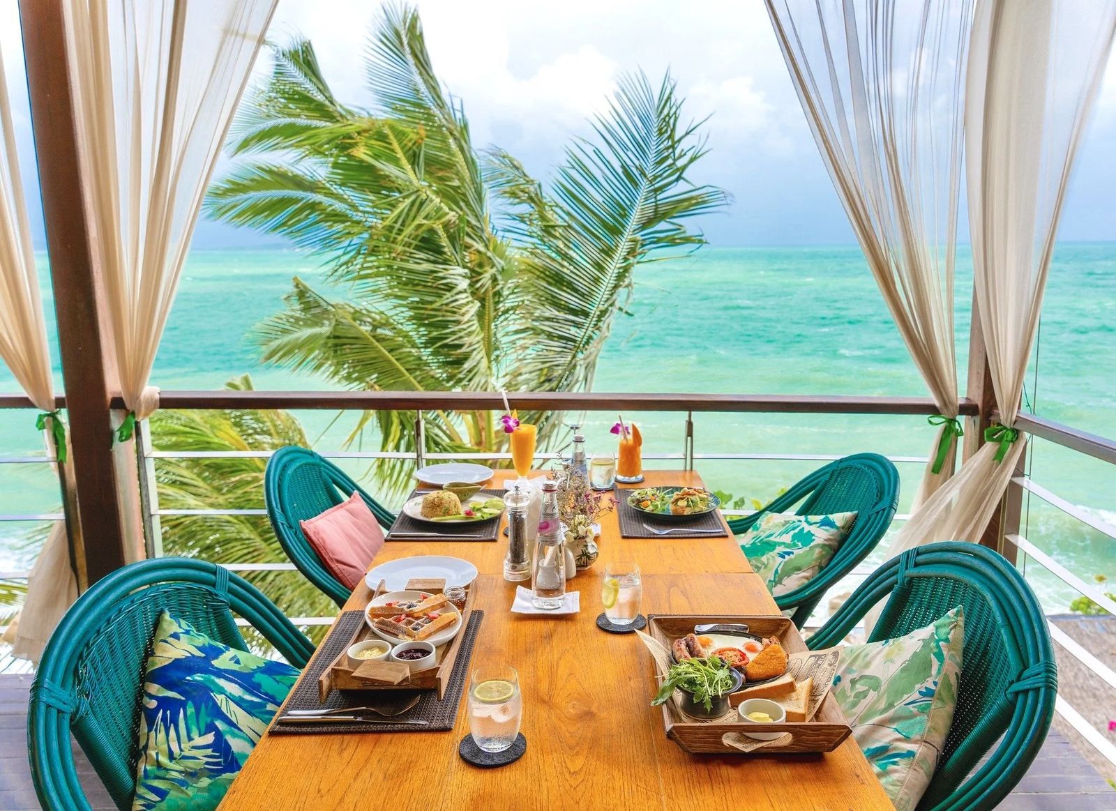 A terrace table facing Chaweng Bay — Dr Frogs Bar & Grill