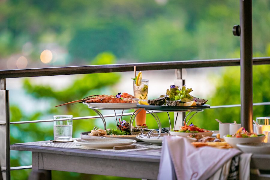 A terrace table above the sea — The Cliff Bar & Grill